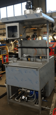 Robottvätt med ultraljud och blåsskåp